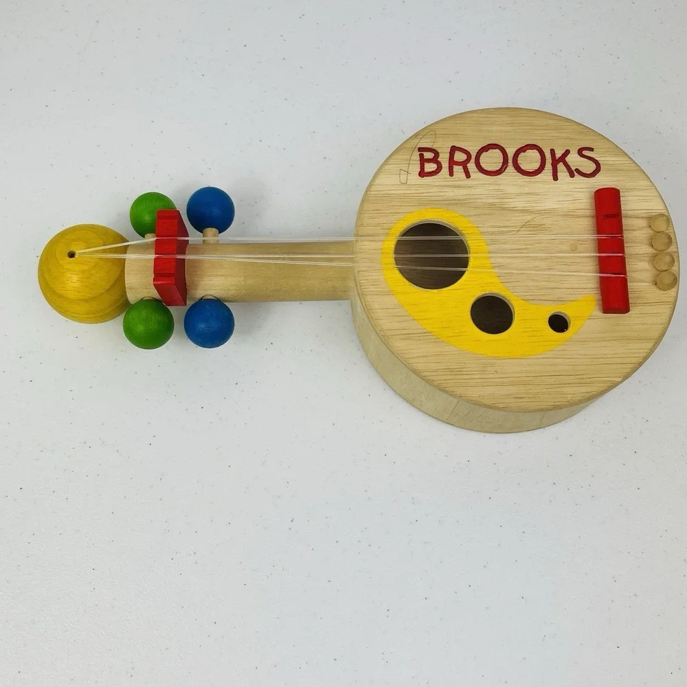 PlanToys Pottery Barn Kids Wooden Musical Banjo Guitar Stringed Instrument